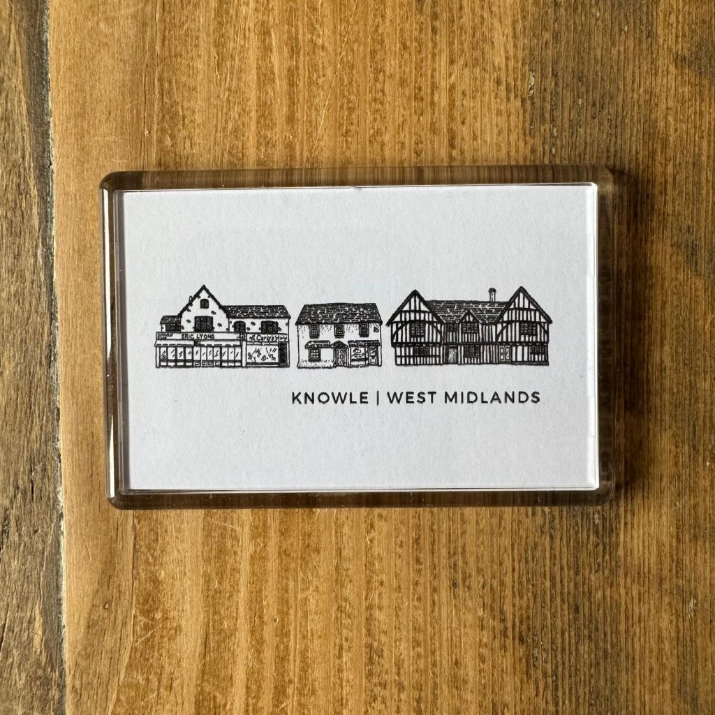 A white fridge magnet with a line drawing of distinctive buildings in Knowle