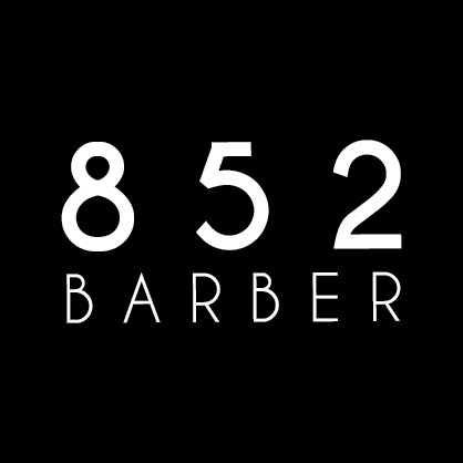 A logo for 852 Barber featuring the business name in white typeface on a black background